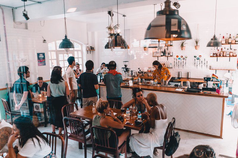 Crowded Cafe scene which used a marketing campaign to attract their audience